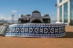 Stunning White, Blue, And Black Geometric Pattern Hippie-inspired Camera Strap. Fixed Price $15.00.