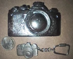 Vintage Asahi Pentax Camera Commemorative Belt Buckle 1977 Keychain. Fixed Price $39.88.