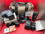 Minolta Maxxum 7000 With 3.LENSES 35MM Auto Focus Film Camera. Fixed Price $950.00.