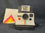 Vtg Polaroid SX-70 Onestep White Rainbow Stripe Camera W/ Itt Magicflash, Manual. Fixed Price $45.00.
