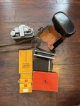 Kodak Medalist Film Camera With Books, Accessories And Filter. Fixed Price $600.00.
