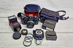 Nikon Em 35MM Slr Series 50MM F1.8 Film Camera & Speedlight Flash. Fixed Price $109.99.