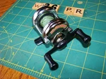 W0036 Pr Mr. Crappie Mini Utra Lite Baitcaster Fishing Reel. Fixed Price $19.95.