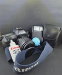 Canon Eos Rebel 35-80 Mm Lens, Strap, Speedlite 200E Flash Untested Battery. Fixed Price $33.20.