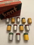 12 Vintage Kodak Colored Metal Film Tin Canisters. Fixed Price $64.99.