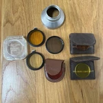 Vintage Lens Filter E. Leitz Wetzlar, Harrison, Tiffen & Omag. Enteco Hood Lot. Fixed Price $59.99.
