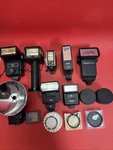 Vintage Camera Flash Lot Vivitar Sunpak Soligor Promatic Argus + Filters. (6). Fixed Price $55.00.