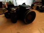 Fujifilm Finepix S4200 Digital Camera 24X Zoom At 14 Mp. Fixed Price $40.00.