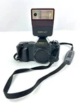 Canon T50 Camera Body, Cap, Strap & Flash Speedlite 244T Good Condition. Fixed Price $36.47.