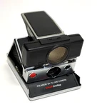 Polaroid SX-70 Land Camera One Step With Sonar Instant Black Silver. Fixed Price $129.00.
