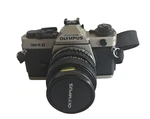 Olympus OM-4T Titanium 35MM Slr Film Camera W/zuiko 35-70MM 3.5-4.5 Lens Works. Fixed Price $450.00.