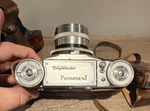 Voigtlander Prominent Kit Nokton 50MM F/1.5 Case, Meter, Boxes Hood, 41 Tripod. Fixed Price $649.99.