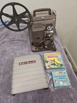 Vintage Bell & Howell 8MM Movie Projector Batman Cartoon Films Tested Working. Fixed Price $100.00.
