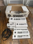 Minolta Accessories Lot - Charger Adaptor Base, Battery Pack, Video/audio Cords. Fixed Price $125.99.