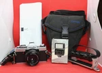 1980 Minolta XG1 Slr 35MM Film Camera W/lens, Tiffen Case, Flash & L-bracket. Fixed Price $82.96.