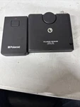 Polaroid Spectra System Remote Control 7030 Receiver, 7020 Transmitter W/ Case. Fixed Price $10.00.