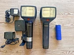 Qty 2 - Rollei E36RE Electronic Flash Units With Sync Cables. Fixed Price $50.00.