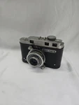 Universal Buccaneer Bakelite 1945 35MM Film Camera With 50MM Lens Vintage. Fixed Price $75.00.