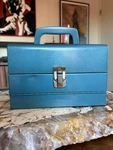Vintage Logan Deluxe Movie Chest Blue Holds 12 Film Canisters For 5" Reels. Fixed Price $16.00.