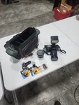 Nikon F70 2 Lenses Battery Flash Attachment And Carrying Case. Fixed Price $150.00.