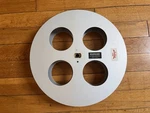35MM 1200 Ft & Film Co Movie Projector Split Reel 11-1/2" New. Fixed Price $100.00.