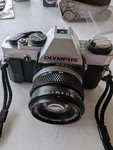 Olympus OM20 35MM Slr Film Camera With Zuiko Auto-s 50 1:1,8 Lens. Fixed Price $135.00.