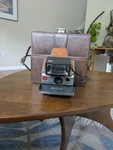 Vintage Polaroid SX-70 Land Camera Brown Leather Original Case + Itt Magicflash. Fixed Price $349.00.
