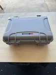 Nanuk 910 Waterproof Hard Case With Foam Insert / Silver - New (other). Fixed Price $62.99.