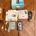 Canon Powershot SD3500 Is Digital Elph 14.1MP Camera Black 5X Zoom Bundle Box. Fixed Price $291.09.