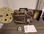 Eiki SSL-0 Slim Line Slotload 16MM Film Projector-extra Bulb/cover/reel/manual. Fixed Price $425.00.