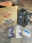 Vintage Mansfield Holiday M-1000 8MM Movie Projector Tested Bulb Original Box. Fixed Price $35.00.