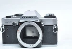 Olympus Film Camera Body Only OM-20. Fixed Price $79.99.
