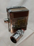 Revere 8 Model 40 Vintage Film Movie Camera With 13MM And 1/2" Telephoto Lens. Fixed Price $36.95.