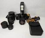 Nikon N2000 Camera With Strap Additional Lenses Flash Attachment &cartridge Case. Fixed Price $206.25.