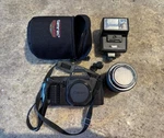 Canon T70 35MM Slr Film Camera Kit W/lens, Case Made In Japan. Fixed Price $49.99.