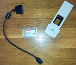 Nikon SA-20 Film Strip Feeder + Adaptec Slim Scsi 1480 Pcmcia Card Cable. Fixed Price $95.00.